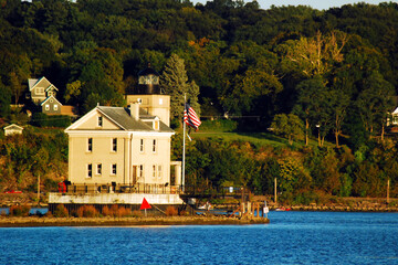 Rondout Lighthouse, near Kingston, New York, assists boats in navigating the waters of the Hidson...