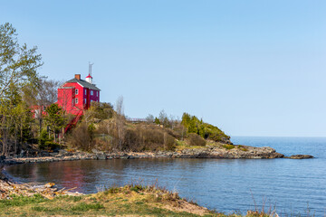Red Lighthouse on Lake Superior in Upper Michigan - 356986027