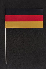 National flag of Germany on black background. National symbols of Germany