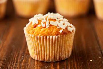 Traditional fresh dessert chocolate muffin on wooden background