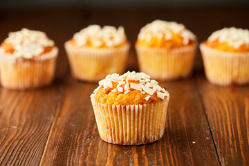 Traditional fresh dessert chocolate muffin on wooden background