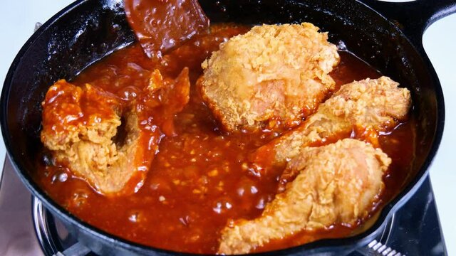 Korean food : Yangnyeom Chicken(Korean fried chicken). Yangnyeom Chicken is mixed with fried chicken made with red pepper paste, tomato sauce, garlic, starch syrup, etc.