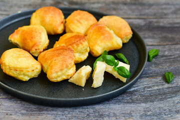 Fresh baked home made  Mini cheese puff pastries.Cheese pie with phyllo pastry and herbs