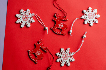 wooden Christmas toys on a red background