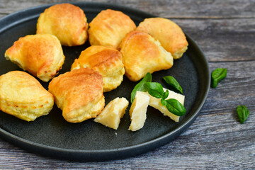 Fresh baked home made  Mini cheese puff pastries.Cheese pie with phyllo pastry and herbs