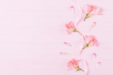 Flat lay composition of delicate buds of alstroemeria flowers