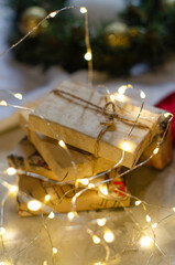 Christmas, New Year gifts packed in craft paper