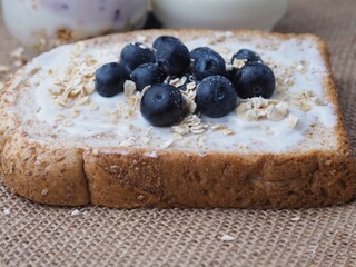 Blueberries-yogurt and whole-wheat bread ,healthy diet concept.