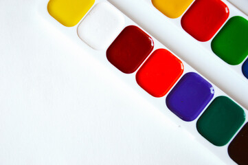 watercolors. bright colors on a white background. accessories for artists, creativity.