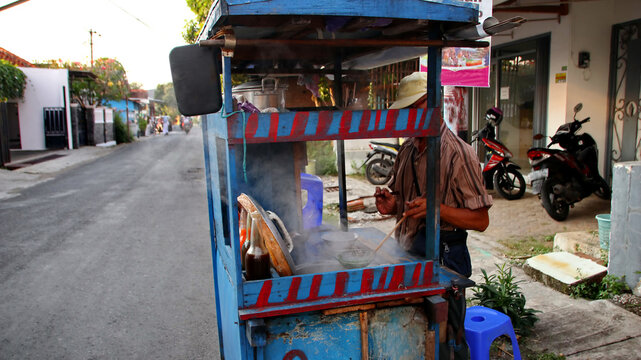Indonesian food, mie ayam, noodles with chicken presented directly by the seller on the cart