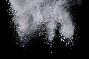 Explosion of white powder isolated on black background. Abstract colored background. holi festival.