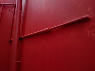 old red wall and pipe