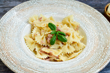 Home made fresh  italian Farfalle pasta   with tuna  ,parmesan cheese and olive oil