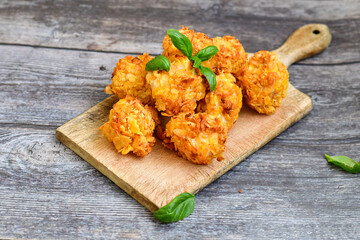  Home made Crispy Chicken   Popcorn with honey mustard sauce on wooden background