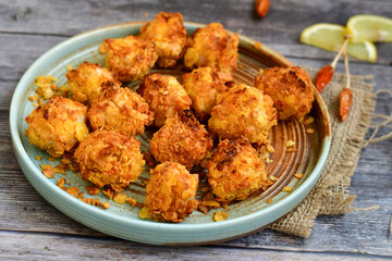  Home made Crispy Chicken   Popcorn with honey mustard sauce on wooden background