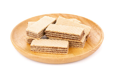 wafers with chocolate in wooden plate isolated on white background