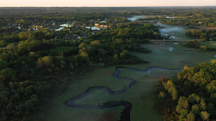  Aerial view of american countryside in the summertime. Sunrise, dawn, misty early morning. North american rural landscape,  Beautiful nature of Midwest