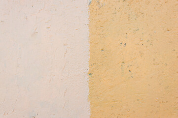 Texture-old orange and pink painted concrete wall