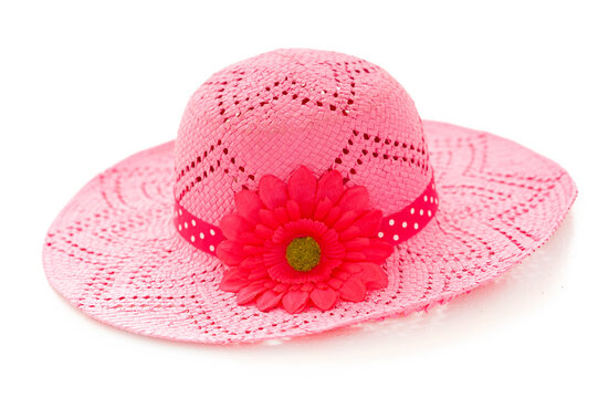 Big And Floppy Pink Hat With A Deep Pink Flower And Pink And White Polka Dot Ribbon. Isolated On A White Studio Background