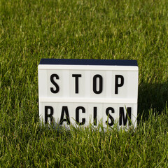 light box with text STOP Racism