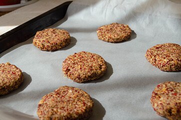 lentil burgers on baking paper close up