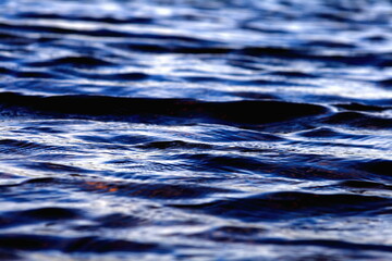 blue water surface closeup, selective foccus