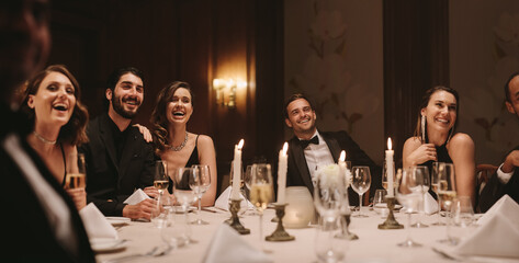High society people having gala dinner party