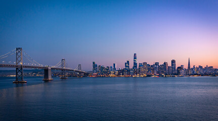 Fototapeta na wymiar San Francisco skyline and bay bridge at sunset