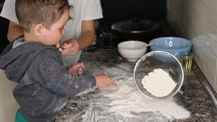 mother and child make dough