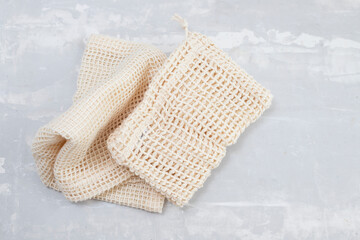 reusable cotton bags for food  on ceramic background