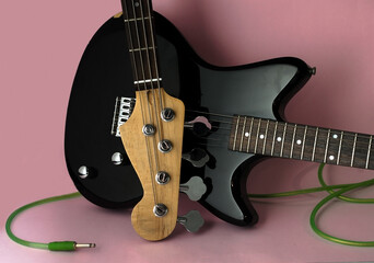 Guitar and Bass in pink background 