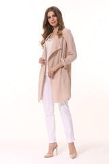 business woman executive posing in summer pink pant suit full body length