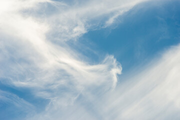 Naklejka na ściany i meble Beautiful blue sky with white clouds on a sunny summer day. 
