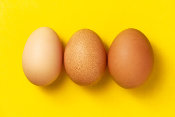 easter eggs on yellow background