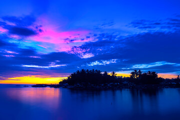 Sunset before an typhoon makes the sky explode with colors at Malandog beach on Panay island,...