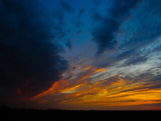 Naklejka premium sunset in the clouds