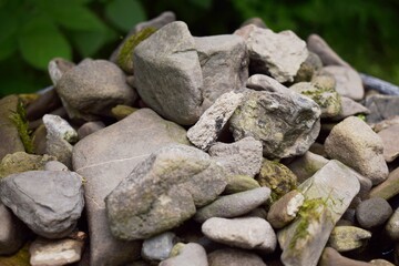 Fototapeta na wymiar River stones for building a garden path