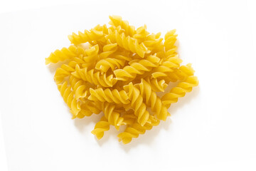 traditional italian fusilli pasta isolated on a white background, spiral bale of pasta, durum wheat...