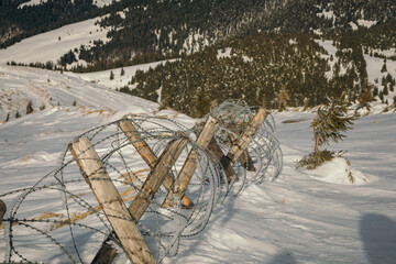 border in the mountains with barbed wire