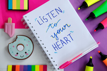 Flat lay stylish set. School stationery. Back to school concept. Top view of modern bright school supplies on table. Trendy back to school mock up with handmade motivational quotes.