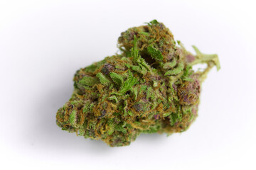 Close up of prescription medical marijuana and recreational weed hybrid OG strain sticky flower bud isolated on a white background