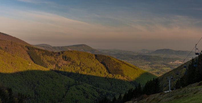 Color spring morning view from Pustevny in Beskydy mountains with cable car