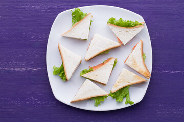 eight sandwiches on the board