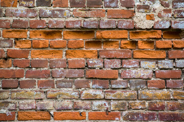 Background of red brick wall texture. Ruined castle.