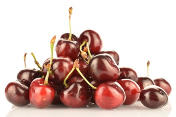 Ripe juicy organic sweet cherry, close-up, on a white background.