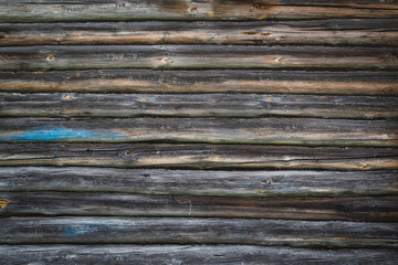 Vintage rustic background. Horizontal wall boards of an old farmhouse.