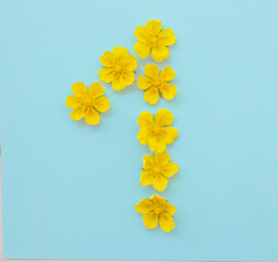  Number 1 on a blue background from yellow bright spring flowers. Children's age, baby month, symbol of flowers
