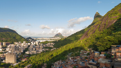 Fototapeta premium View of Rio from the hills behind the city. Cristo Redentor is visible on the mountain.