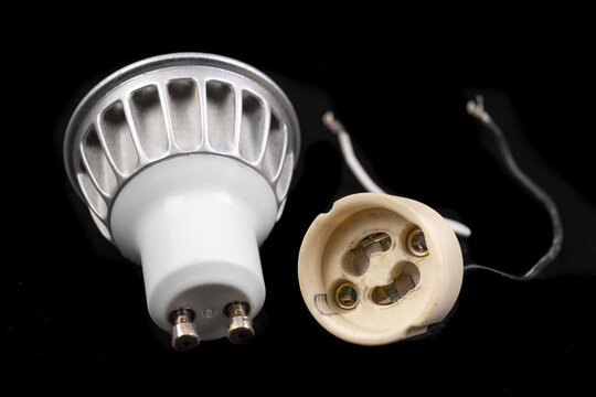 LED bulbs on a dark table. LED lighting and connectors for the energy source.