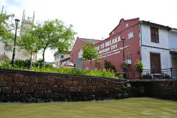 MELAKA, MALAYSIA -NOVEMBER 12, 2012: The scenery along the way at Melaka waterfront while riding the Melaka River Cruise. The river is the main trade route during the golden age of the Malacca Sultana